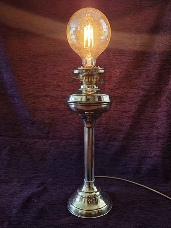 Victorian brass oil lamp brought into the electric age ON