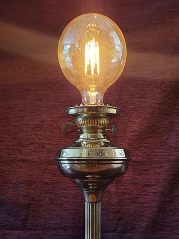 Victorian brass oil lamp brought into the electric age CLOSE UP